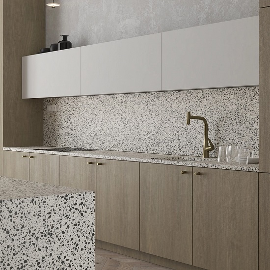 a kitchen with Technistone Taurus Terrazzo White worktops, walls, and floors