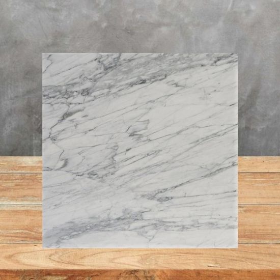 a sample of Bianco Carrara Venato marble honed
