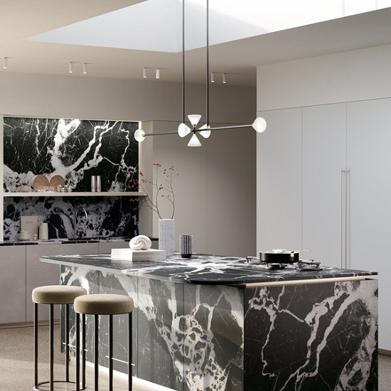 a white kitchen with a black island in Sapienstone Grand Antique 4D