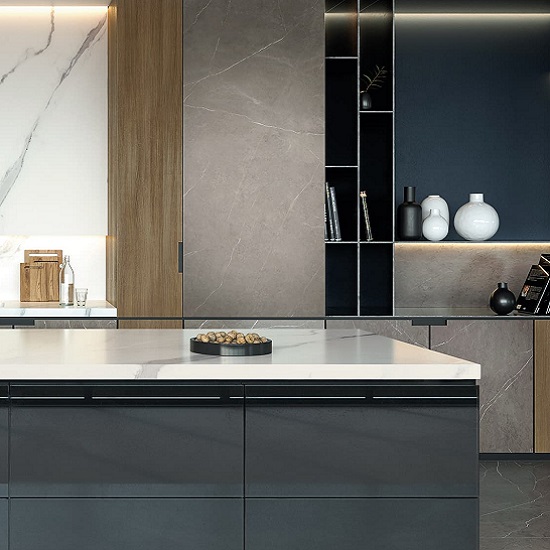 a photo of a modern kitchen with Xtone Liem Grey worktops and a white island