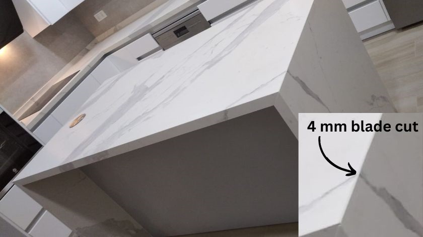 a book matched marble worktop joint showing the blade cut