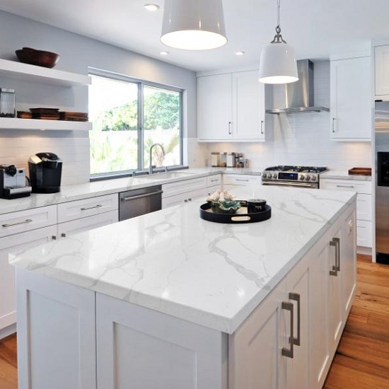 a white kitchen with Nile Quartz Calacatta Classic worktops