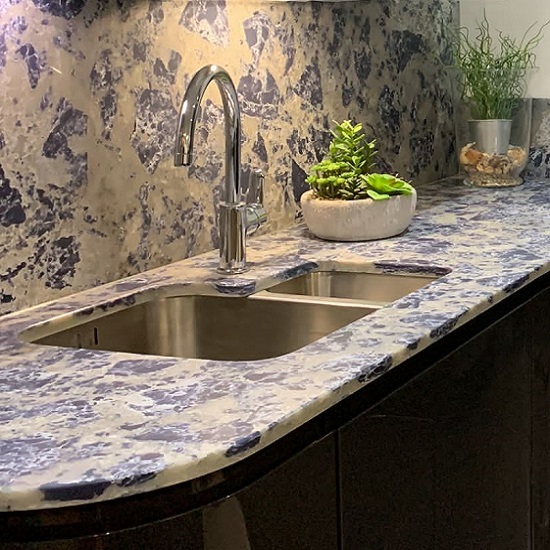 a photo of a kitchen with Nile Quartz Blue Lagoon worktops