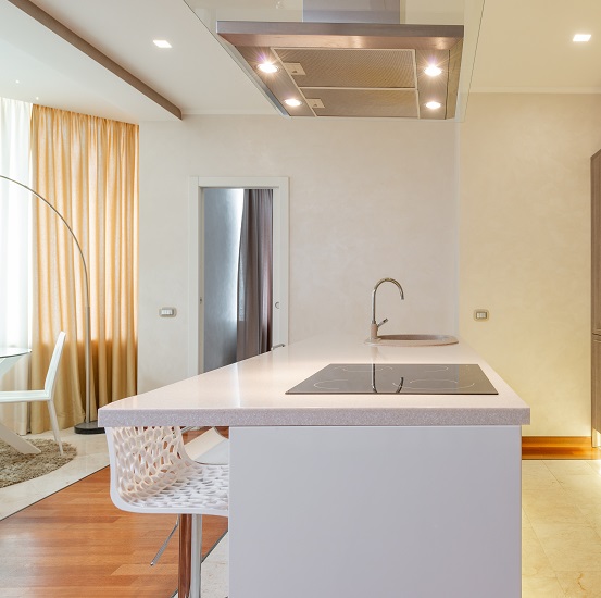 a modern kitchen with Nile Quartz Concrete Earth worktops