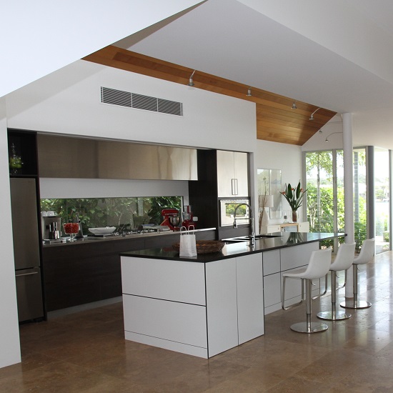a Nile Quartz Royal Grey kitchen island in a modern room