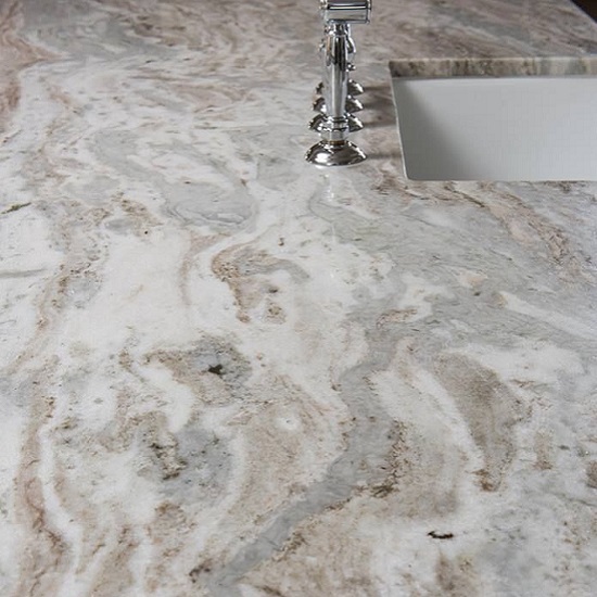 a close-up photo of Fantasy Brown marble worktops