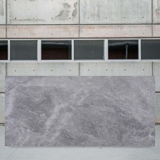 an image of a Mystic Grey marble slab in a stone yard