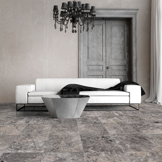a living room with Mystic Grey marble floor tiles