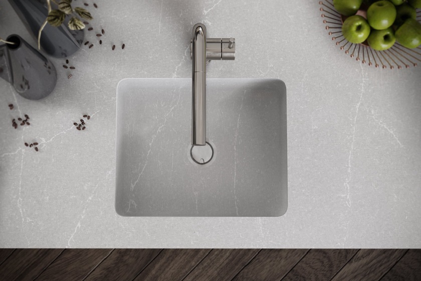 a photo of a Silestone Desert Silver worktop and an integrated sink in matching material