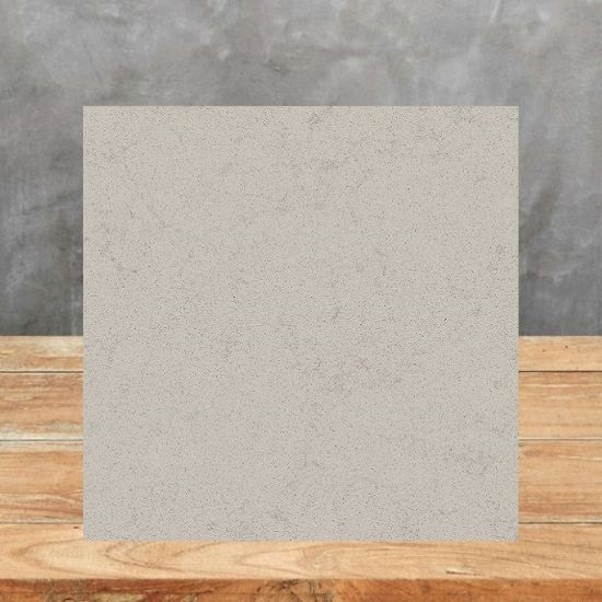 an image of a Technistone Noble Portland Grey sample and a grey background