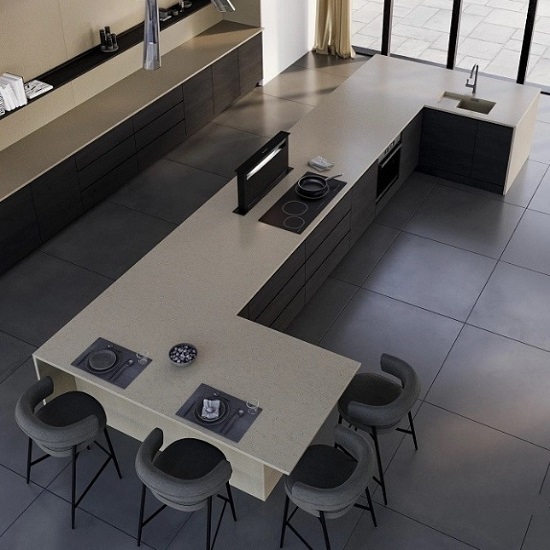 a photo of modern space with a Technistone Noble Portland Grey kitchen island