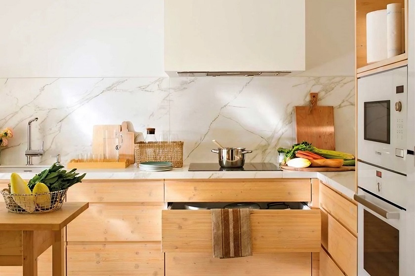 Marble designs such as Neolith Estatuario and Calacatta Luxe bring luxury to shabby kitchens.