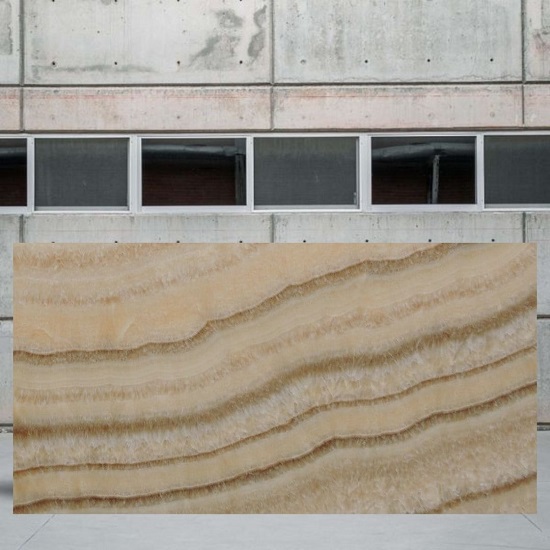 an image of a Cappuccino Onyx slab outside a stone yard
