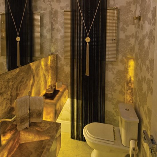 a photo of a bathroom with Cappuccino Onyx retro-illuminated
