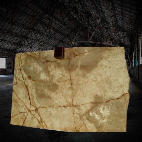 an image of a Spider Onyx backlit slab inside a dark warehouse