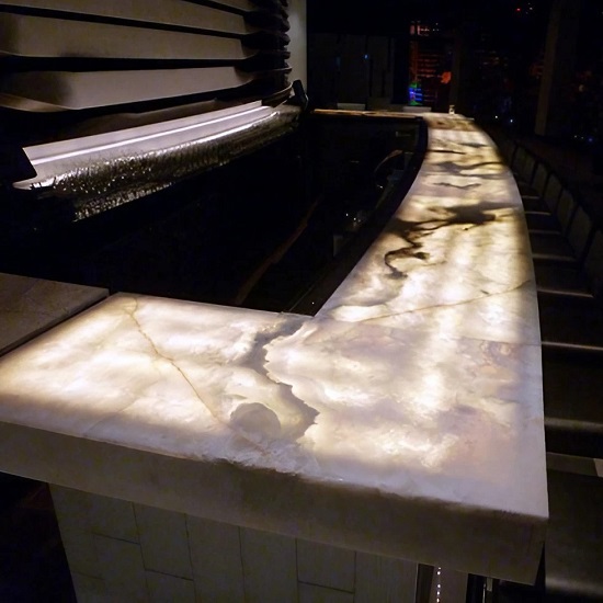 a photo of White Onyx kitchen worktops backlit