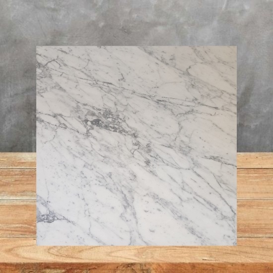 an image of a Venatino marble sample and a grey background