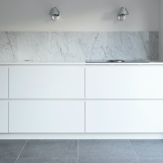 a photo of a white kitchen with Venatino marble kitchen worktops and a splashback