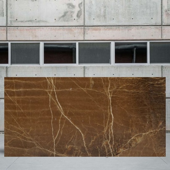 an image of a vein cut Brown Onyx slab outside a stone yard
