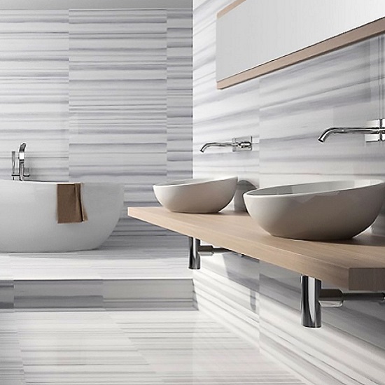 a bathroom with Marmara Marble walls and vanity surfaces