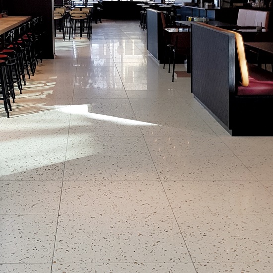 a photo of cream terrazzo floor tiles Ca D' Oro in a bar
