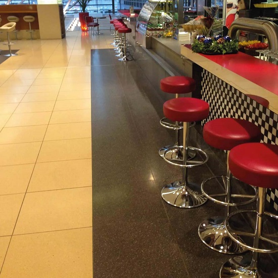 a photo of a bar with Terrazzo Beige Agglotech SB108 floor