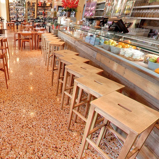 Terrazzo Giallo floor tiles in a modern café