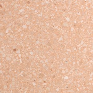 a close-up of terrazzo Rosa, a stone with a delicate pink base