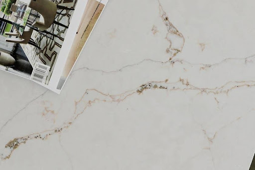 A close-up of a Silestone Versailles Ivory veined marbled surface