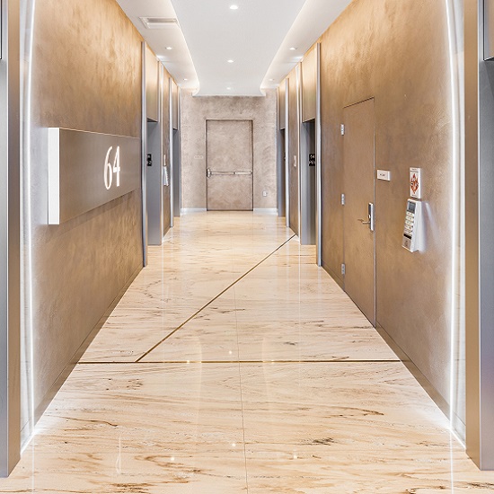 a photo of Palissandro Marble tiles in a hallway