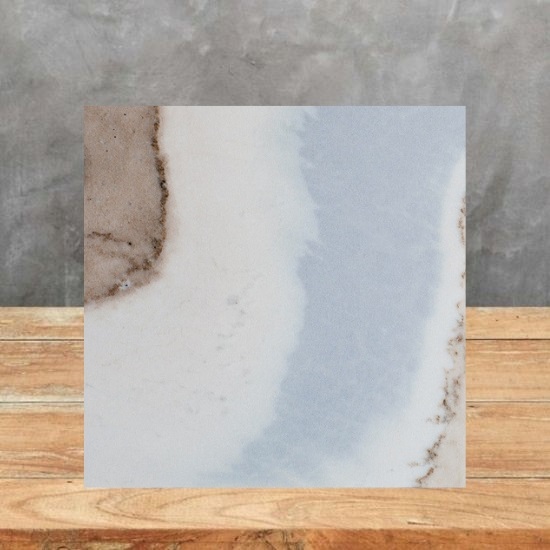 an image of a Palissandro Reale Marble sample and a grey background