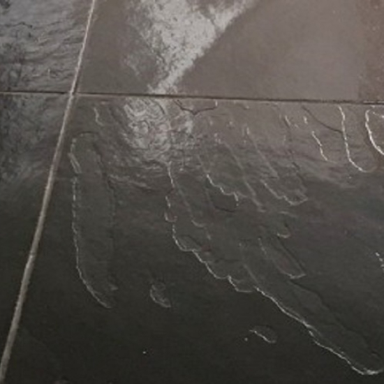 a photo of Black Riven Slate floor tiles