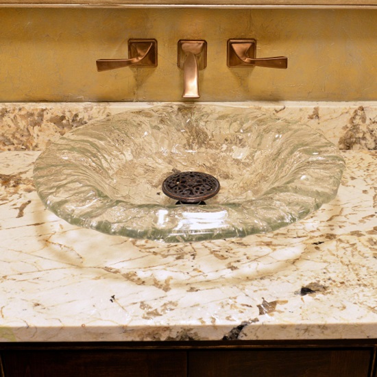 an Alpinus Granite vanity top and a glass basin