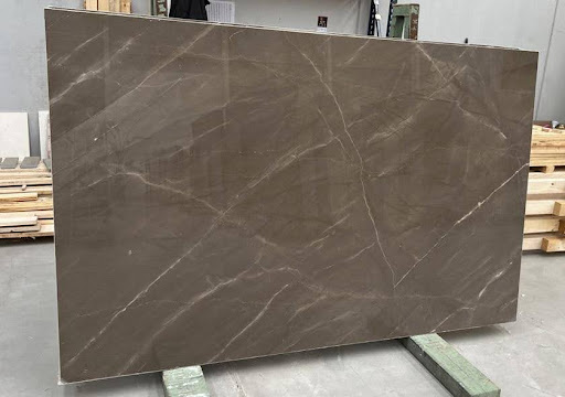A large brown marble slab