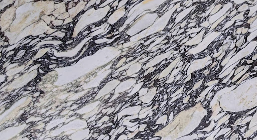 A close-up of a Calacatta Viola marble Slab