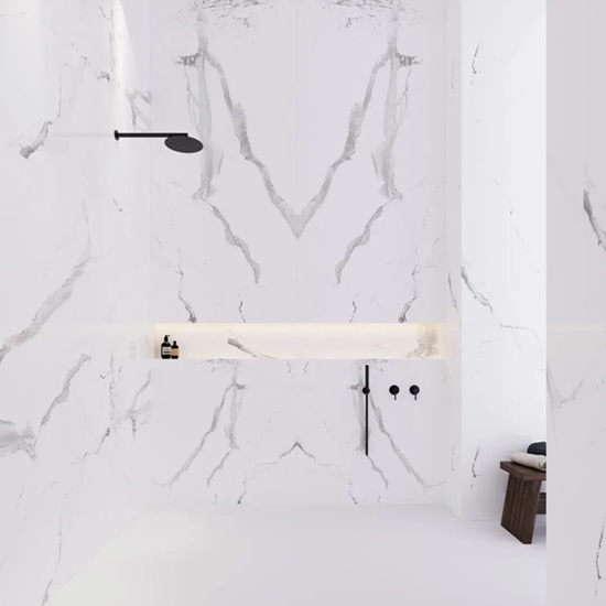 a photo of a bathroom with Uniceramica Statuario cladding