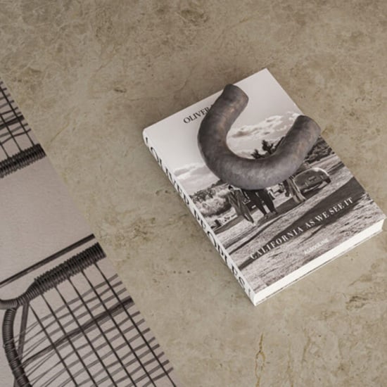 a Caesarstone Mosstone porcelain colour and a book on top