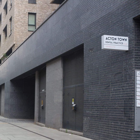 a London road sign and Azul Noche granite cladding