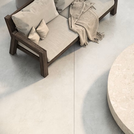 a Dekton Sandik tabletop and matching floor tiles