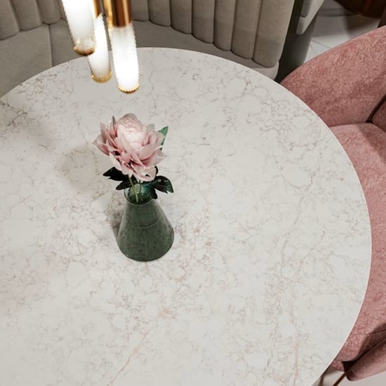 a Silestone Riviere Rose round table top