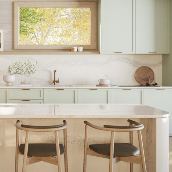 a kitchen with Caesarstone Calacatta Stillstorm worktops