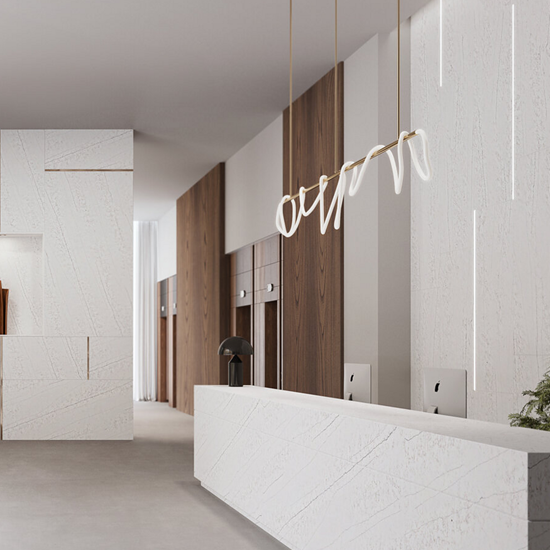 a reception room with the desk and wall in Quartzforms Lasa