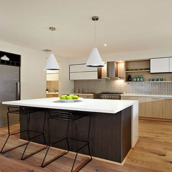 a Caesarstone Pure White kitchen island