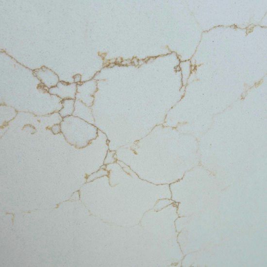 Close-up detail of Calacatta Amber quartz surface in white with fine branching amber gold veins and intricate Calacatta pattern