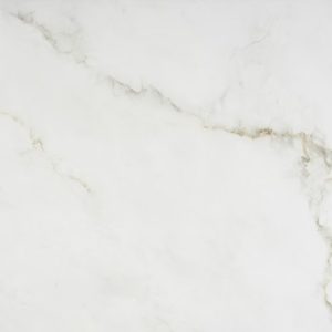 Close-up texture of Dekton Keena worktop surface showing soft white base with gentle golden veins