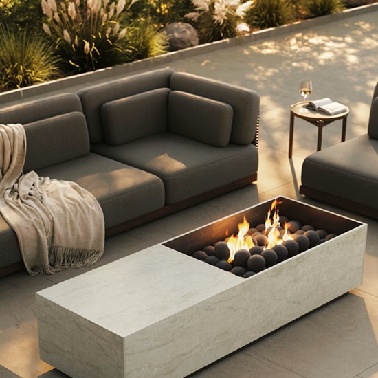 Dekton Nara outdoor fire pit table in patio setup for UK gardens, durable Cosentino worktop with beige tones for Weybridge in Elmbridge homes.