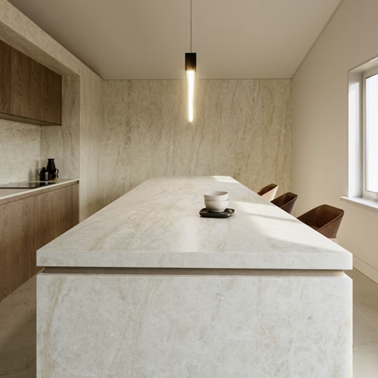 Dekton Nara kitchen island countertop in contemporary UK home design, warm beige veining on Cosentino surface for durable worktops in Chelsea residences.