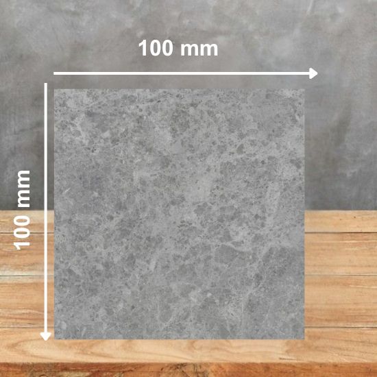 100mm x 100mm sample tile of Neolith Cappadocia Sunset sintered stone displaying soft grey veining and texture