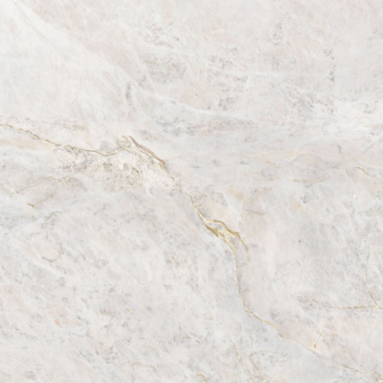 Close-up of Neolith Everest Sunrise sintered stone surface showing delicate white base with subtle grey and golden veining