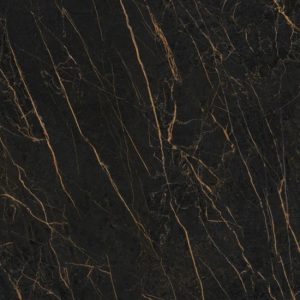 Extreme close-up of Neolith Mamba sintered stone displaying deep black base with intricate golden veining patterns